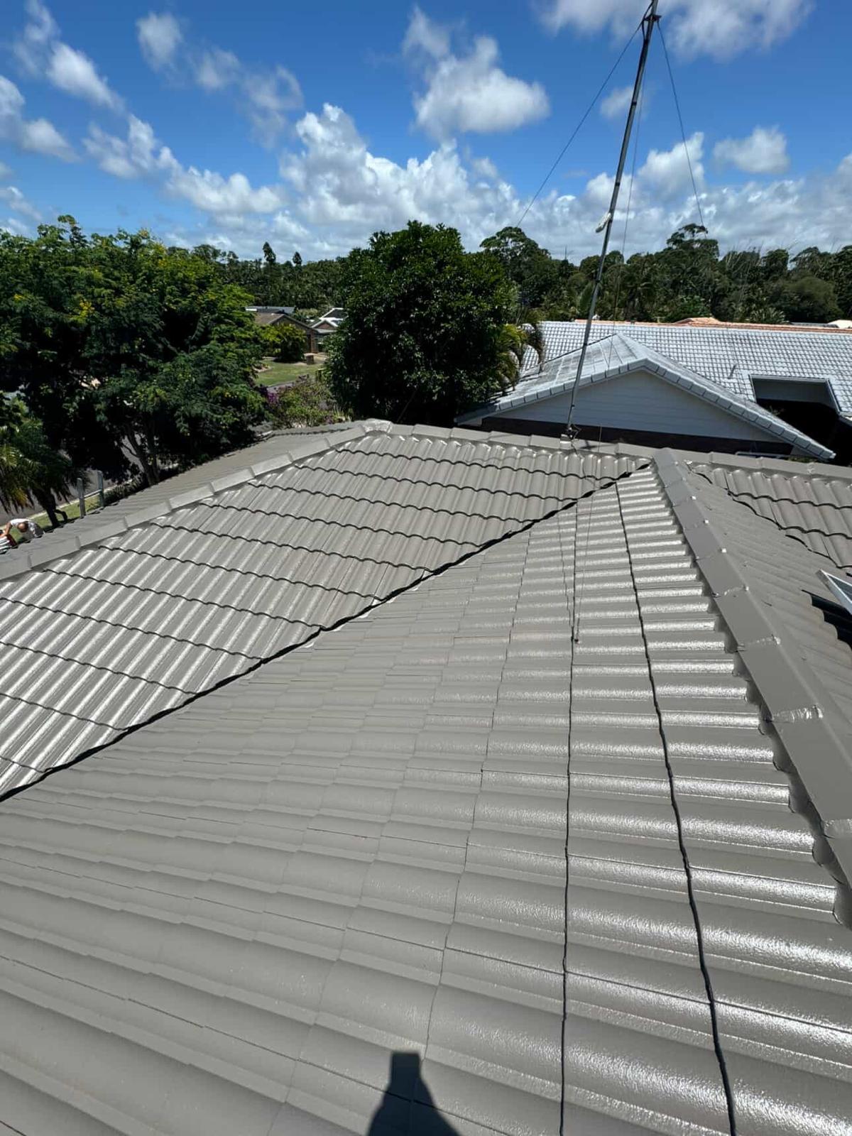 Clean restored grey tile roof